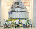 The CST-100 Starliner spacecraft to be flown on ӰƵ’s Orbital Flight Test (OFT) is viewed Nov. 2, 2019, while undergoing launch preparations inside the ӰƵ Crew and Cargo Processing Facility at Kennedy Space Center in Florida. During the OFT mission, the uncrewed Starliner spacecraft will fly to the International Space Station for NASA’s ӰƵ Crew Program.